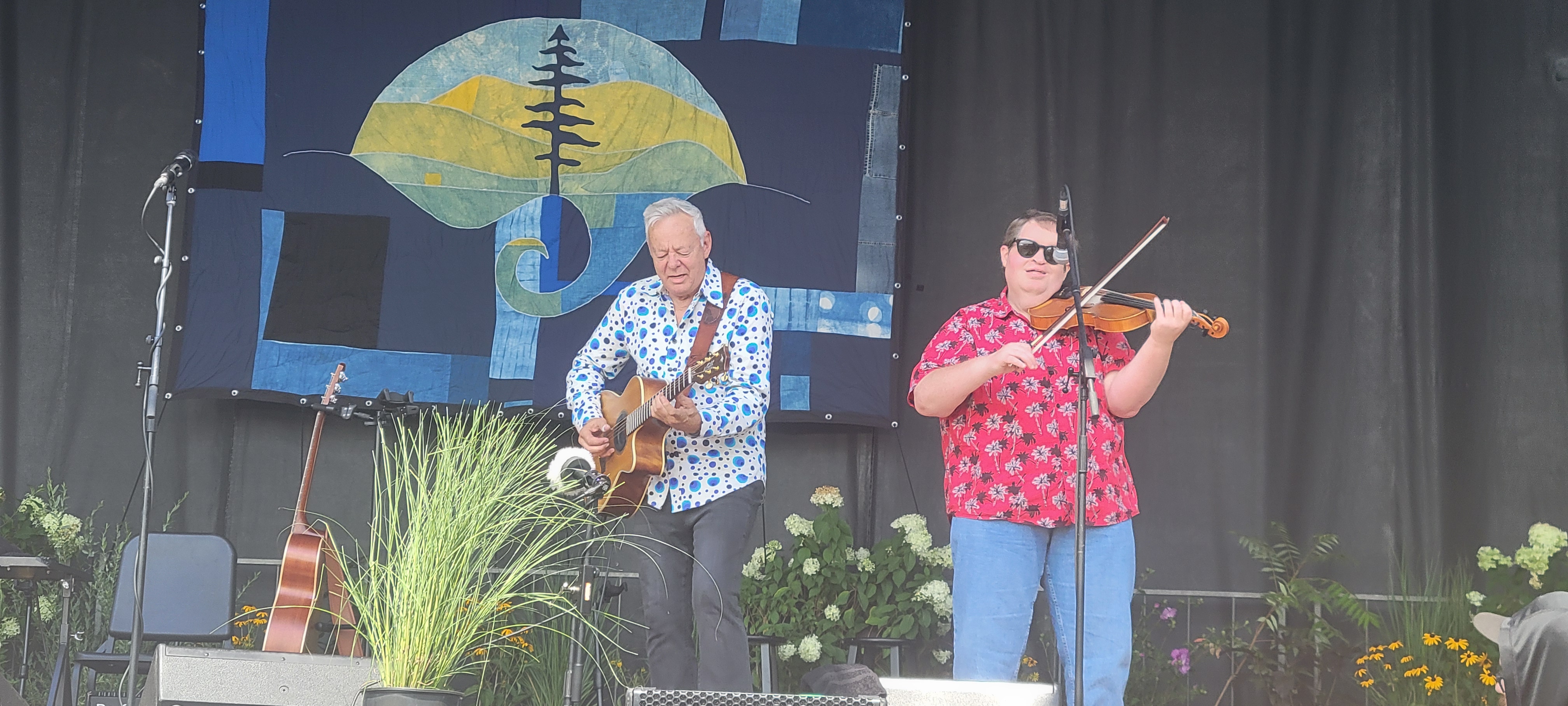 TommyEmmanuelMichaelCleveland2025-08-17GreenMountainBluegrassAndRootsFestivalVT (3).jpg